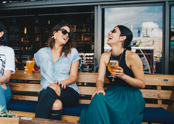 Friends gathering beer table